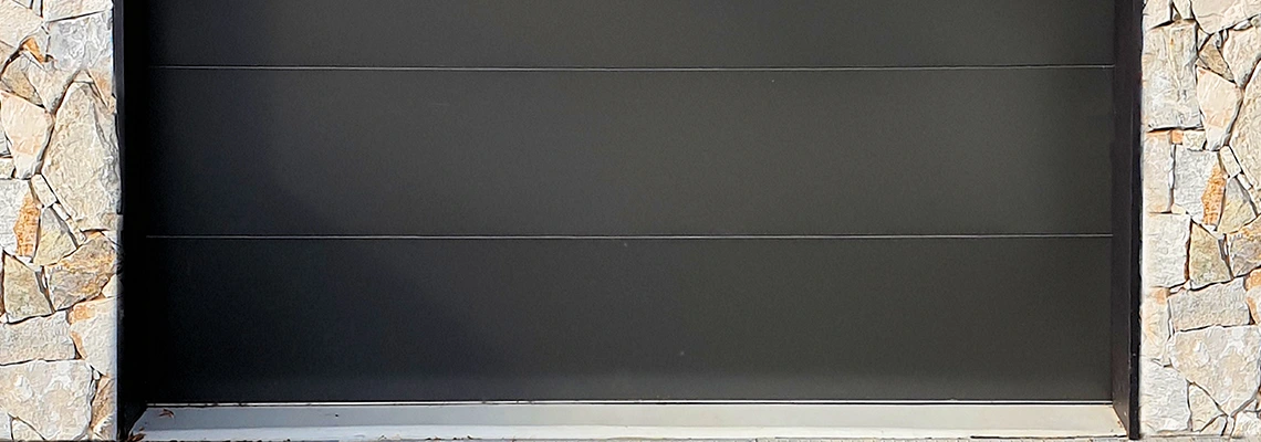 Overhead Black Garage Door Installation in Sturgeon Falls, ON