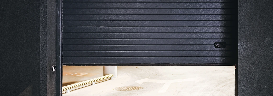 Residential Black Garage Door Installation in Sturgeon Falls, ON