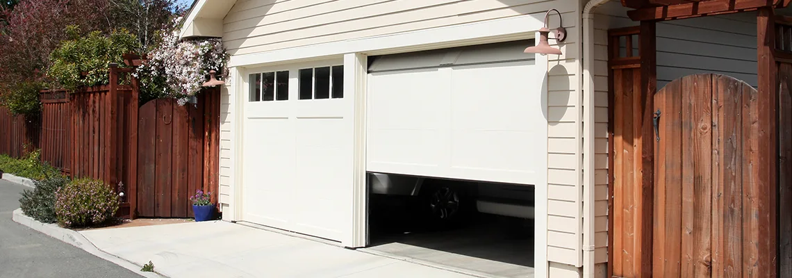 Fix Metal Garage Door Jerking in Sturgeon Falls, ON