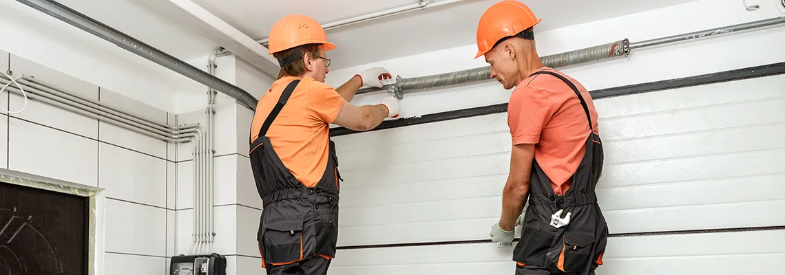 Car Drove Into Sliding Garage Door Replacement in Sturgeon Falls